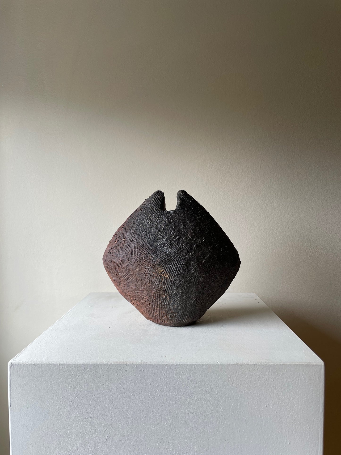 Two Faced Axe Vessel